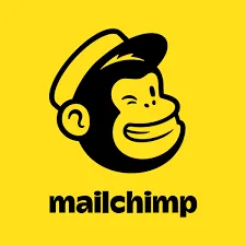 Mailchimp's mascot monkey face wearing a hat with bold text 'mailchimp' below on yellow background.